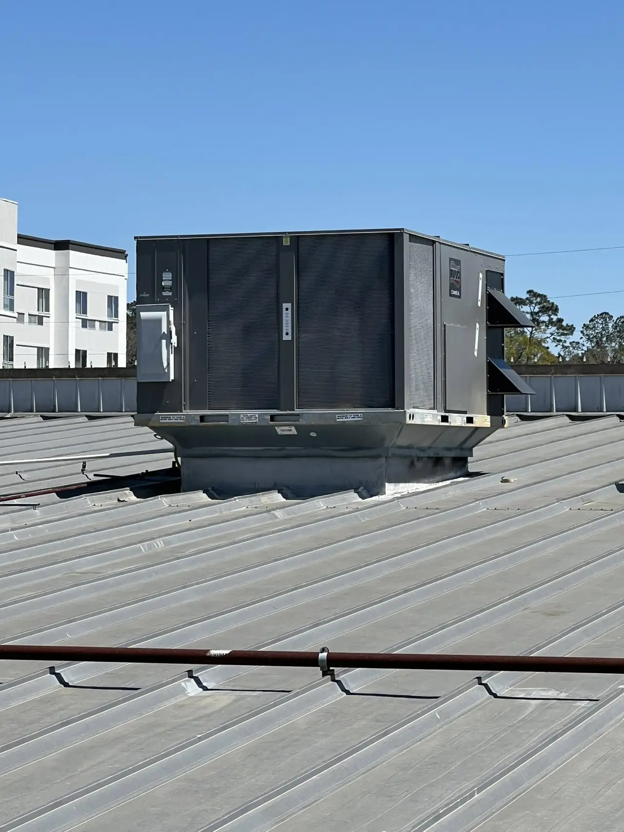 Rooftop HVAC unit on a metal roof